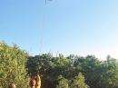 Alden Sumner Jones IV, KC1JWR, is lifted in a litter to a helicopter after his rescue from a Vermont wilderness trail. [Andy McLean via Vermont State Police and the Bennington Banner]